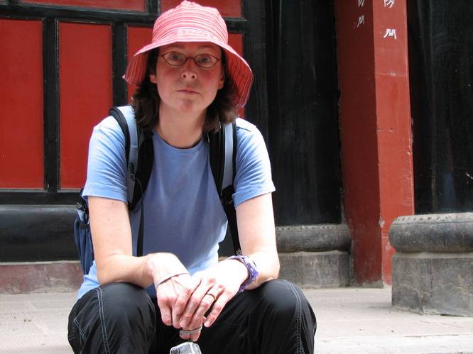 Janet contemplating the coming flight to Lhasa. Chengdu, China.